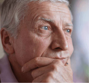 Elderly man thinking