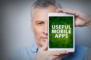 Elderly man on mobile device
