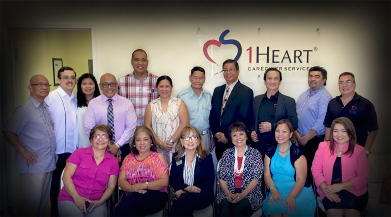 A group photo of the 1Heart Las Vegas Grand Opening and Ribbon Cutting Ceremony