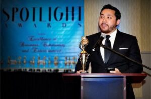 Kevin Tagarao (VP of Operations - 1Heart Caregiver Services) receives the award on the company's behalf