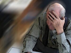 Upset elderly man