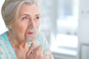woman with oxygen care at home