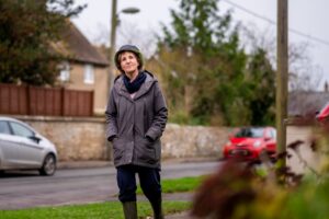 senior woman walking outside