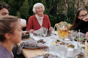 senior woman celebrating life with her family