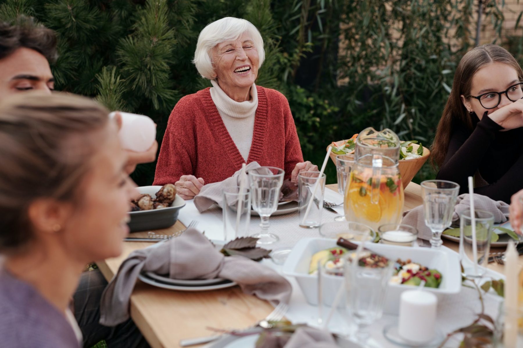 senior woman celebrating life with her family