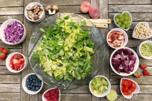 Various fruits and vegetables set on a table
