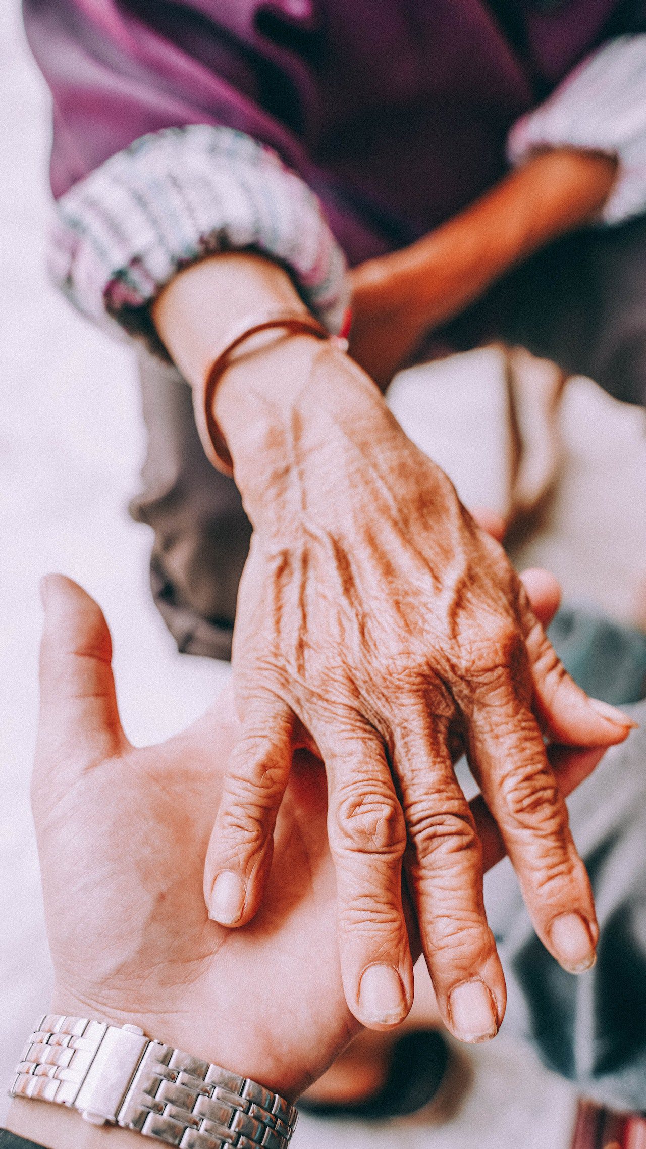 Photos of arthritis in an elderly woman’s hand.