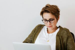 A woman working on a laptop